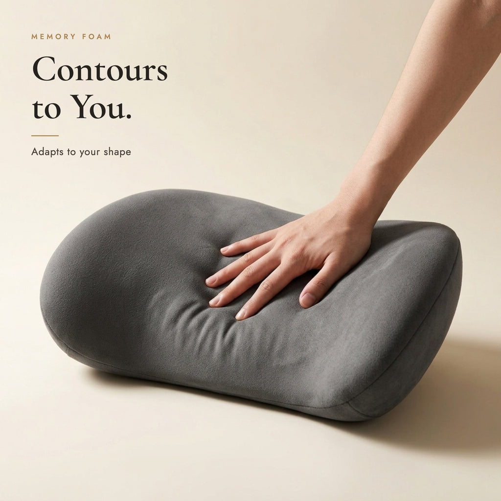 Hand pressing into the memory foam lumbar pillow