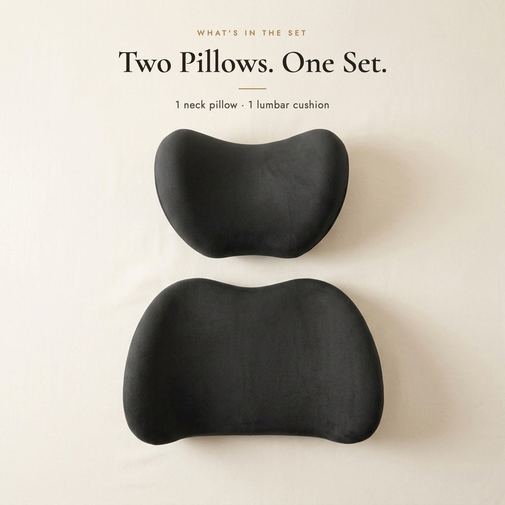 What's in the set: one black neck pillow and one black lumbar cushion, top view