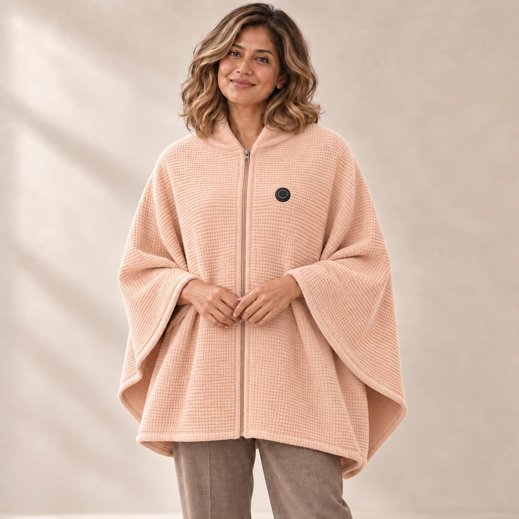 Woman wearing the Apricot heated zip-up knit poncho wrap