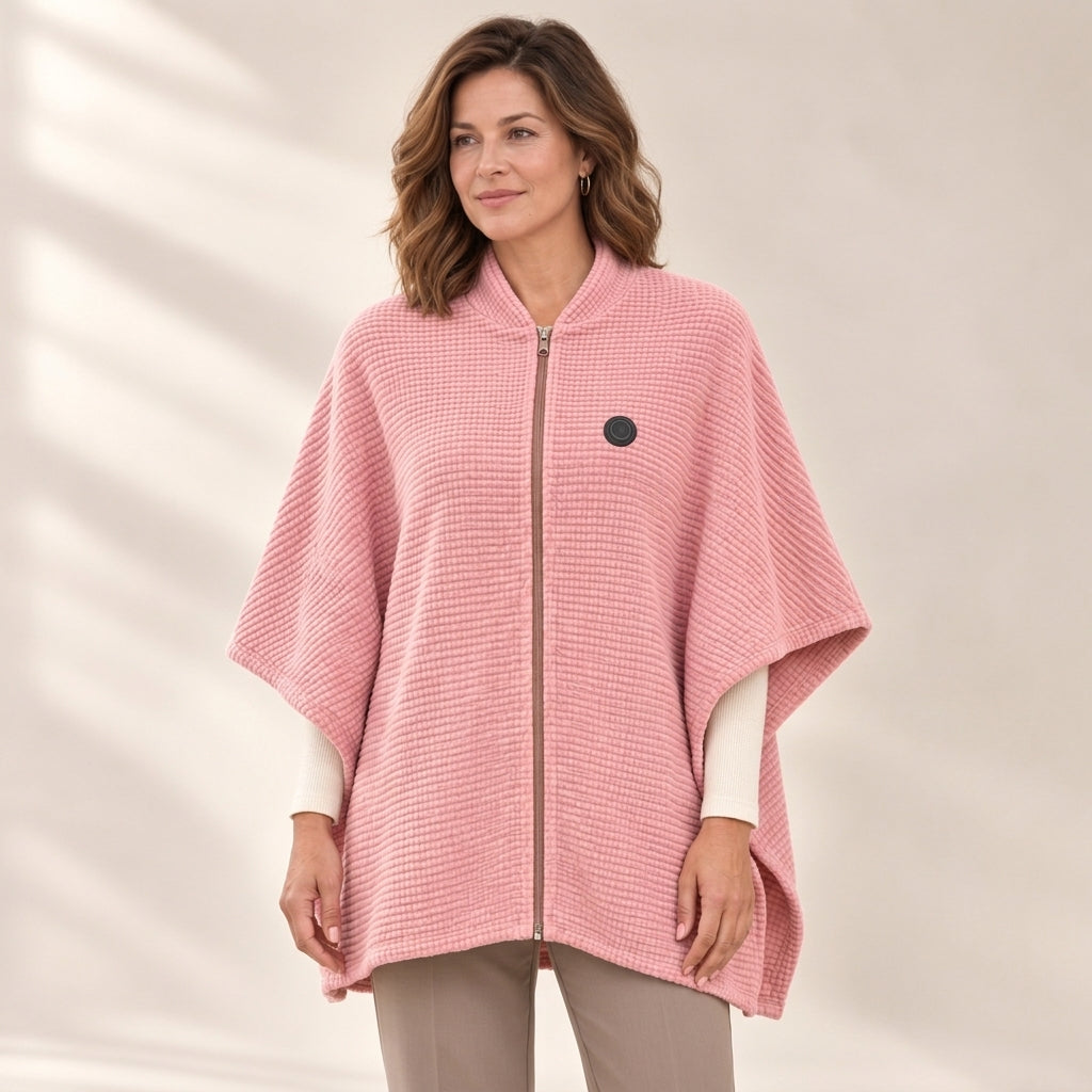 Woman wearing the Blush Pink heated zip-up knit poncho wrap